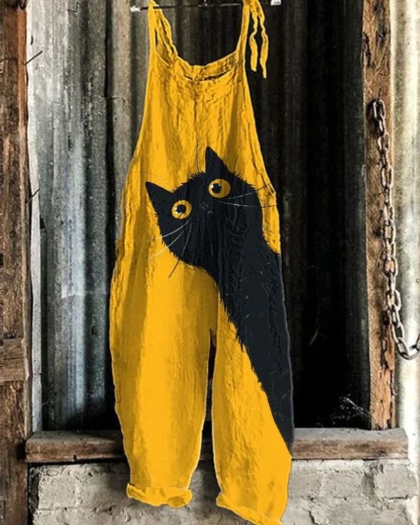 SOLEA | Light, handmade jumpsuit in yellow pattern with black cat