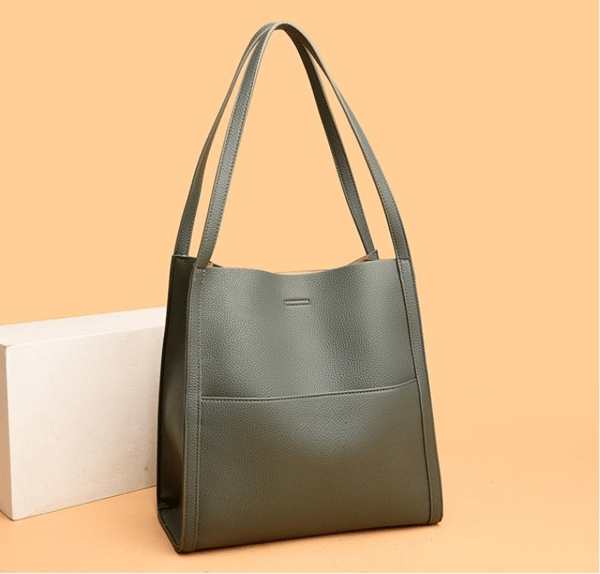 Genuine leather shoulder bag in solid and simple colours