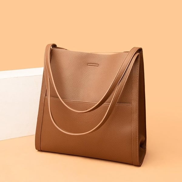 Genuine leather shoulder bag in solid and simple colours