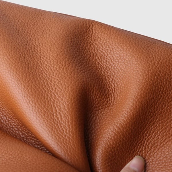 Genuine leather shoulder bag in solid and simple colours