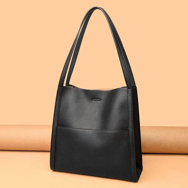 Genuine leather shoulder bag in solid and simple colours